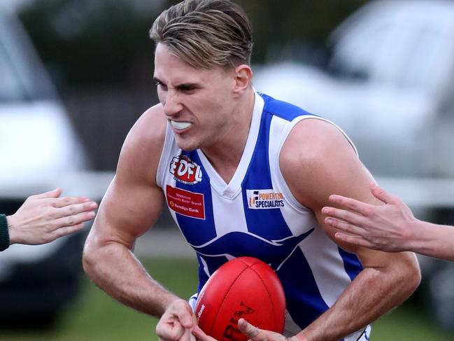 Kirk Lang of Oak Park gathers the ball during the EDFL football match between Airport West and Oak Park played at Airport West on Saturday 4th August, 2018.