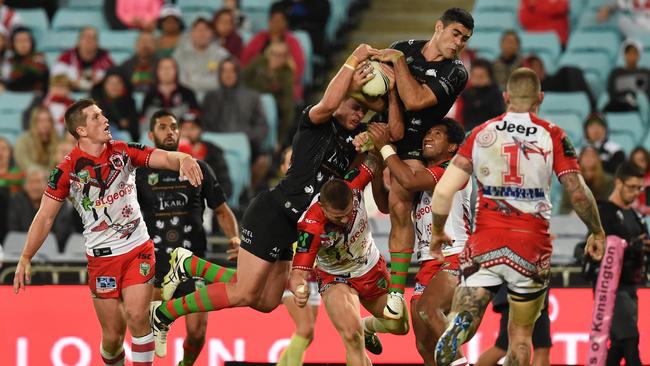 Bryson Goodwin and Jack Gosiewski take the high ball against the Dragons last week.