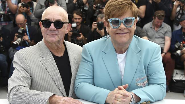 Songwriter Bernie Taupin, left, and longtime friend and collaborator Elton John at the Cannes Film Festival last week. Picture: Joel C Ryan/Invision/AP