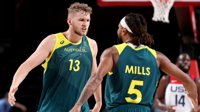 Jock Landale Patty Mills react against Team United States. Picture: Getty Images