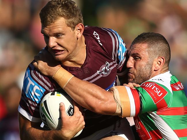 SYDNEY, AUSTRALIA - MARCH 11:  Tom Trbojevic of the Sea Eagles is tackled by Robbie Farah of the Rabbitohs during the round two NRL match between the Manly Sea Eagles and the South Sydney Rabbitohs at Lottoland on March 11, 2017 in Sydney, Australia.  (Photo by Mark Metcalfe/Getty Images)