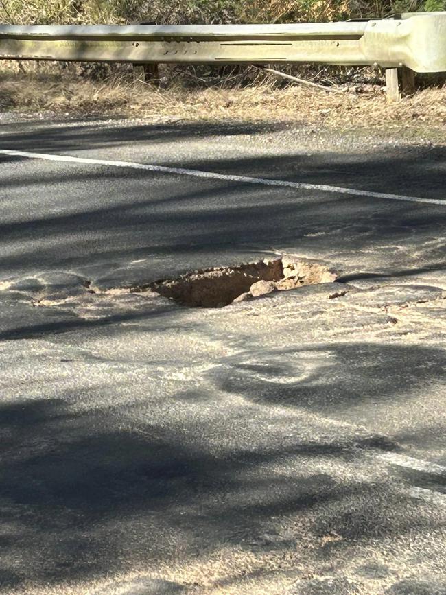 A deep pothole located on the Melba Highway. Photo: Supplied.