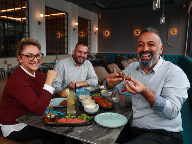 (One of the best middle eastern restaurants in western Sydney, Lazeez.) Lazeez managment team, Abbie Bayad and Roger Al Hachem, with restaurant owner, Osama Haddad, at their new restaurant in Bass Hill, today.Picture:Justin Lloyd.