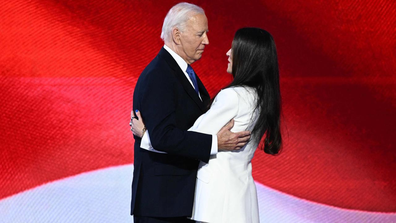 Joe Biden hugs his daughter Ashley Biden after she introduced him. Picture: AFP..