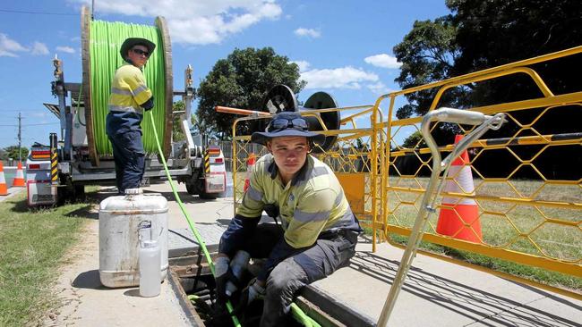 Workers linstall NBN cable. Picture: Chris Higgins