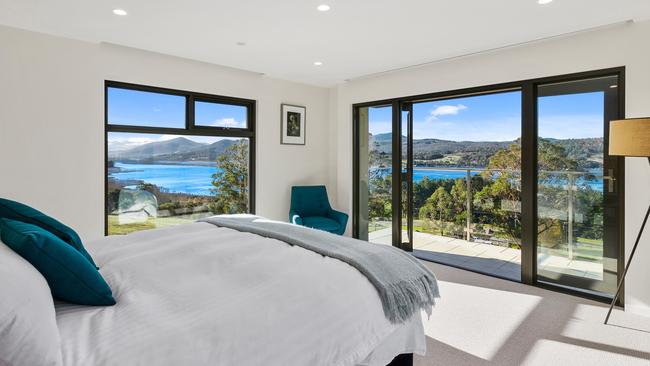 The meandering river below is visible from the house’s huge windows.