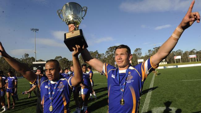 Naden lifts another trophy, for Patrician Brothers Blacktown in 2013.