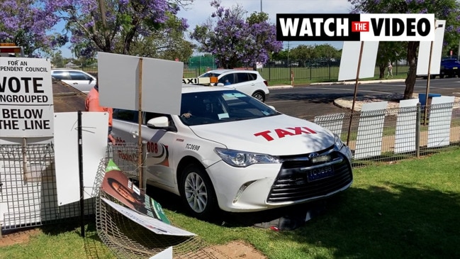 Taxi crashes into polling place