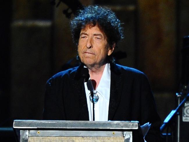 FILE - In this Feb. 6, 2015 file photo, Bob Dylan accepts the 2015 MusiCares Person of the Year award at the 2015 MusiCares Person of the Year show in Los Angeles. The Swedish Academy says it has received the required lecture from the 2016 Nobel Literature winner Bob Dylan, enabling the American singer-songwriter to collect 8 million Swedish kronor ($922,000) in prize money. (Photo by Vince Bucci/Invision/AP, File)