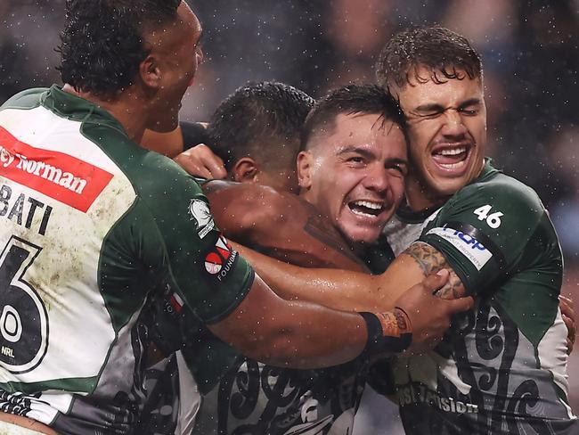 SYDNEY, AUSTRALIA - FEBRUARY 12: Kodi Nikorima of the Maori All Stars celebrates with his team mates after scoring a try during the match between the Men's Indigenous All Stars and the Men's Maori All Stars at CommBank Stadium on February 12, 2022 in Sydney, Australia. (Photo by Mark Kolbe/Getty Images)