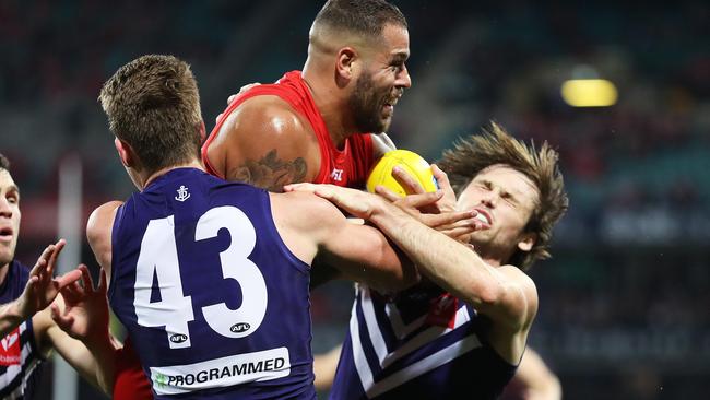 Lance Franklin collects Joel Hamling with an elbow. Picture: Phil Hillyard