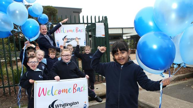 Whttington Primary School principal Craig Smith and students celebrate their first day back at school for term two. Picture: Alison Wynd