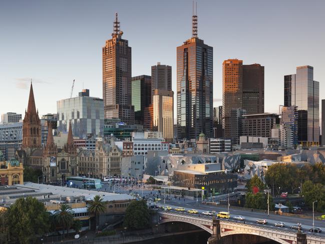 Australia, Victoria, VIC, Melbourne, skyline with Yarra River and Princess Bridge, elevated view, sunset