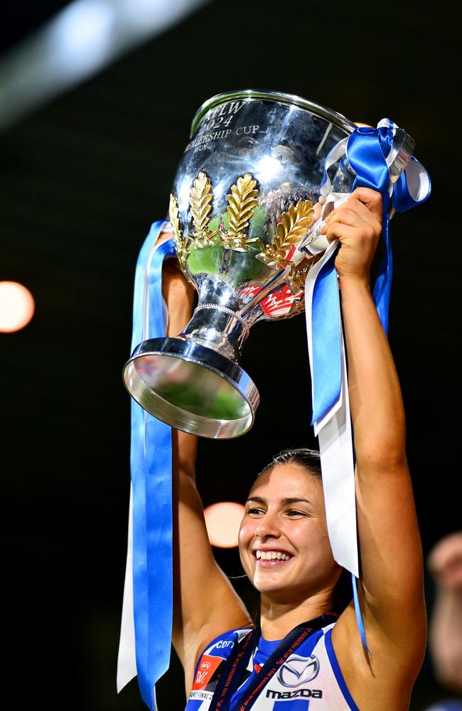 Ruby Tripodi holds the premiership cup aloft. Picture: Quinn Rooney/Getty Images