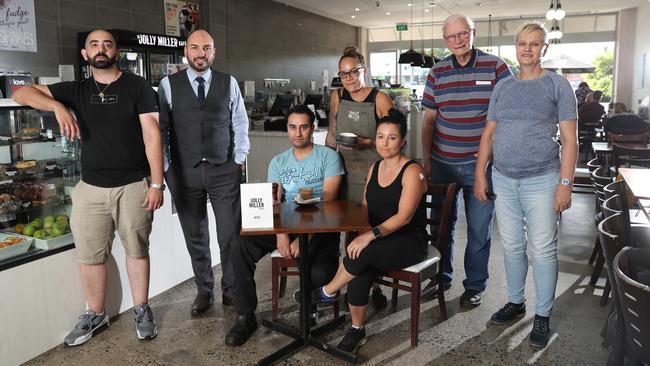 Melton residents: Jolly Miller Cafe owner Don Nardella, Joe Mavrikos, Gagandeep Singh, Skye Gooch, Sharon Bezzina, Tom Kovarik and his daughter Marliese French. Picture: Alex Coppel