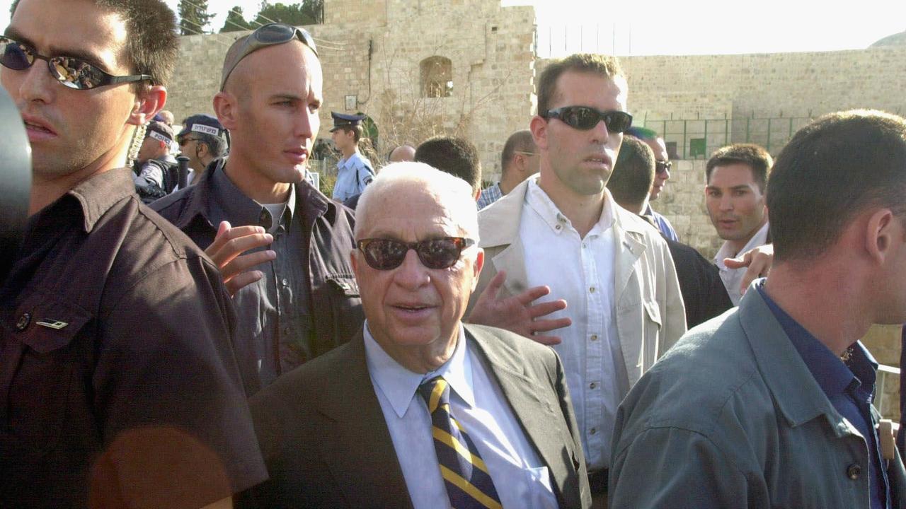 Opposition leader Ariel Sharon as he leaves the Temple Mount in 2000. Picture: AP Photo/Eyal Warshavsky