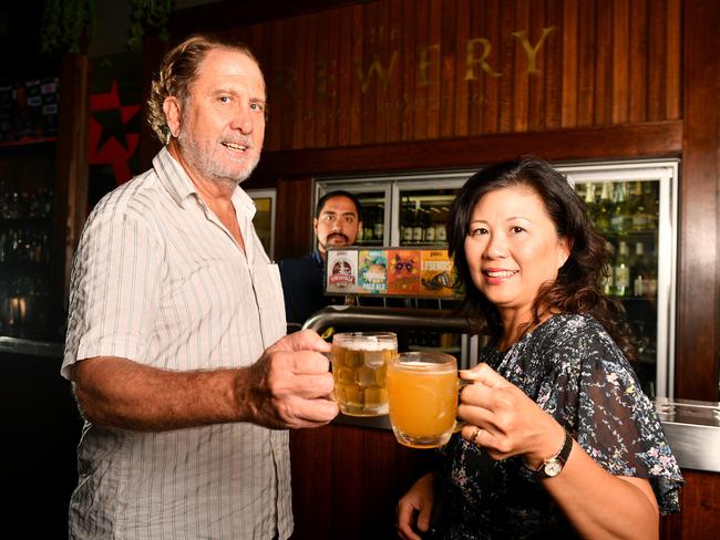 Kim Bredhauer and Lydia Leong have purchased the Townsville Brewery. (back) Tristan Bredhauer will be the new Manager. Picture: Alix Sweeney