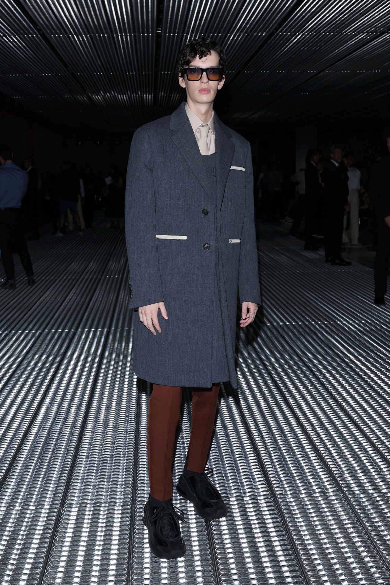 <p>The trend is bigger than the red carpet too. Aussie actor Kodi Smit-McPhee embraced the look for <a href="https://www.gq.com.au/style/trends/prada-spring-summer-2024-review/image-gallery/cd674914ee6fe151541de2d9041d4ee9" target="_blank" rel="noopener">Prada’s spring/summer 2024</a> show, going a lighter shade of khaki under a charcoal grey suit. With the drama around neckwear and formality, this is one look steadily gaining momentum that we can get behind.</p>