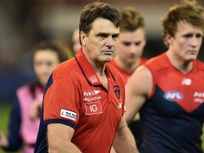 Coach of the Demons Paul Roos is seen during the Round 15 AFL match between the Melbourne Demons and the Adelaide Crows at the MCG in Melbourne, Sunday, July 3, 2016. (AAP Image/Julian Smith) NO ARCHIVING, EDITORIAL USE ONLY