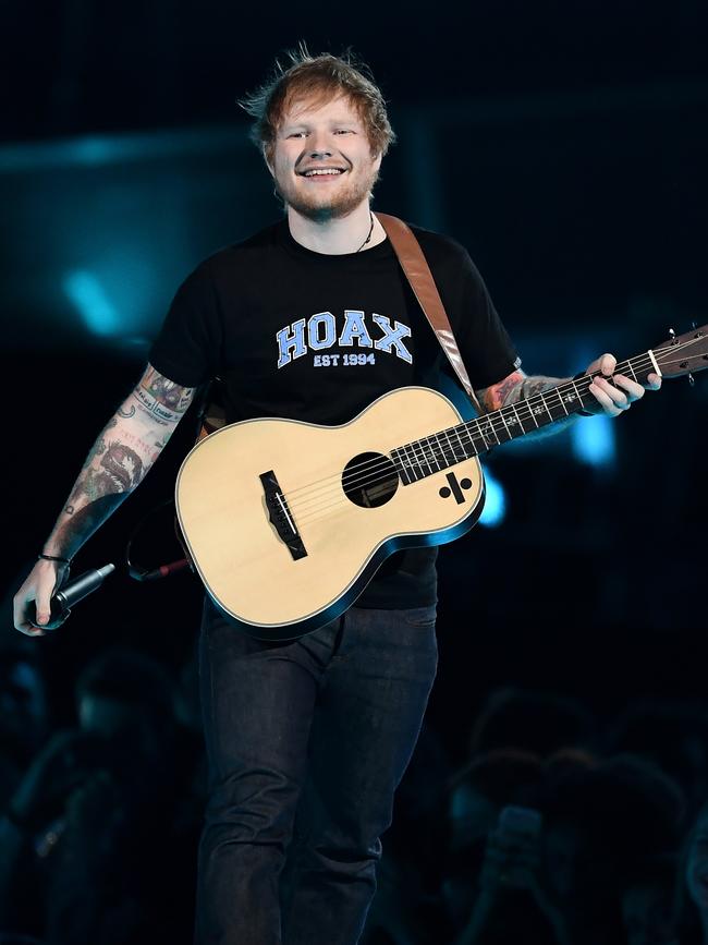 Just busy breakin’ records. (Photo by Gareth Cattermole/Getty Images)