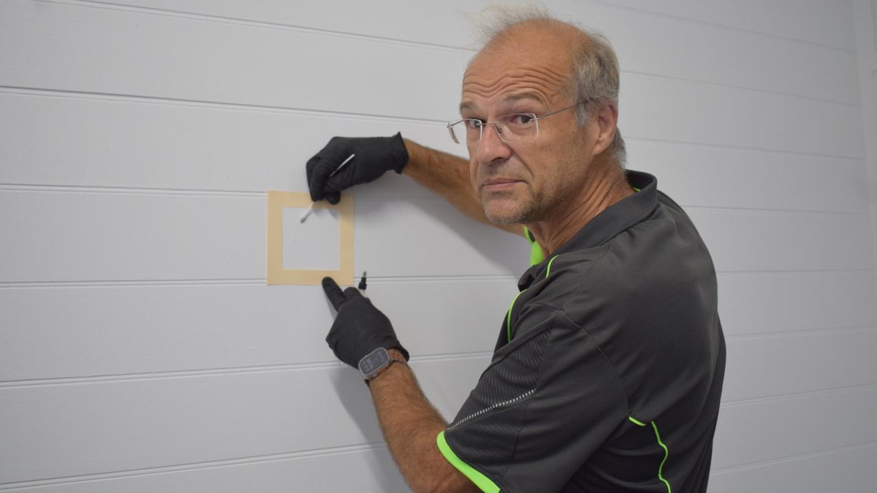 PestX owner Scott Lawton demonstrating building methamphetamine testing. Picture: Aden Stokes