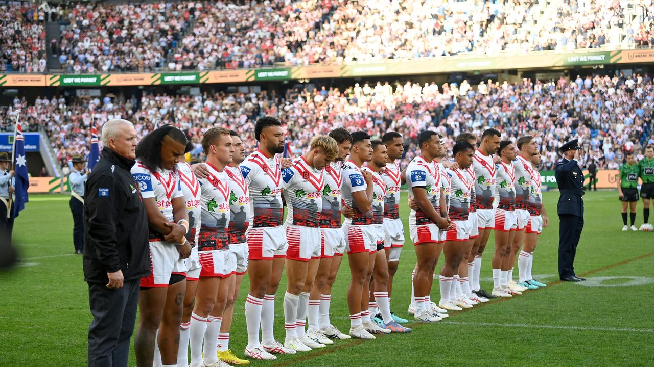 Players line up ahead of an Anzac Day match. Picture: NRL Photos/Gregg Porteous