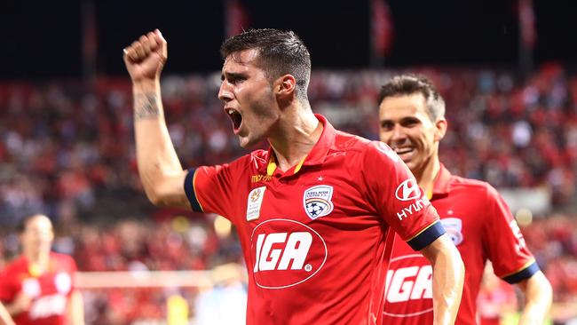 Former Adelaide United striker Sergio Guardiola celebrates a goal.