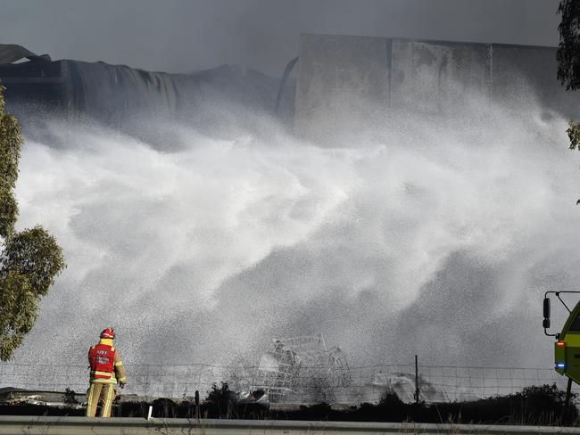 Firefighters near the blaze were forced to expose themselves to a bulk of flammable chemicals. Picture: Andrew Henshaw