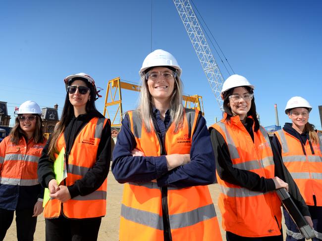 AFLW player and John Holland finance officer Kirsten McLeod (centre) with John Holland engineers Monica Santos-Chaney, Maria Agudelo, Lauren Knights and Libby Paynter at the Hobsons Bay main sewer upgrade project at Spotswood. Picture: Andrew Henshaw