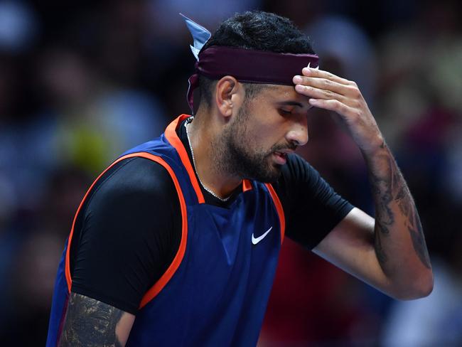 Australia's Nick Kyrgios reacts during his match Bulgaria's Grigor Dimitrov in the 2022 World Tennis League exhibition match at Dubaiâs Coca-Cola arena in the United Arab Emirates, on December 21, 2022. (Photo by Ryan LIM / AFP)