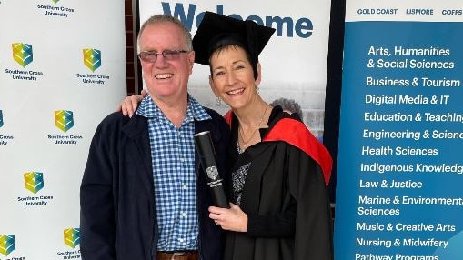 After a horror road cycling accident interrupted her studies, Liesel Brown has finally graduated and it almost didn't happen due to a second round of COVID-19 shutdowns at SCU. She is pictured here with husband Mick.