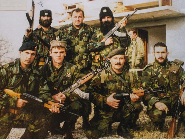 Zoran Tadic, centre top, and Nikola Pozder, bottom second from right) with members of his brigade. Picture: Supplied