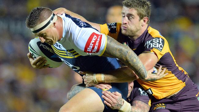 NRL NQ Cowboys versus Brisbane Bronco's at 1300 Smiles Stadium in Townsville, QLD. Cowboy's Tariq Sims and Bronco's Andrew McCullough. Picture: Wesley Monts