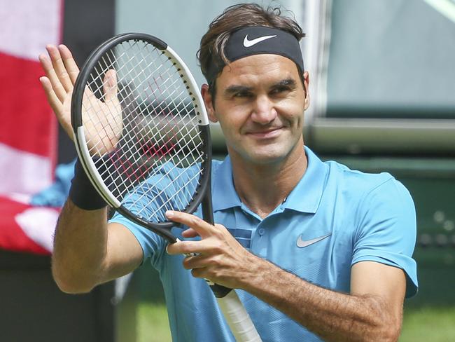 Roger Federer returns to the top of the Wimbledon draw despite losing the world No 1 ranking to Rafael Nadal Picture: AP