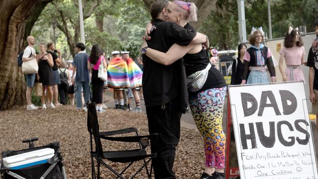 One man was seen offering participants “dad hugs”. Picture: NCA NewsWire / Jeremy Piper