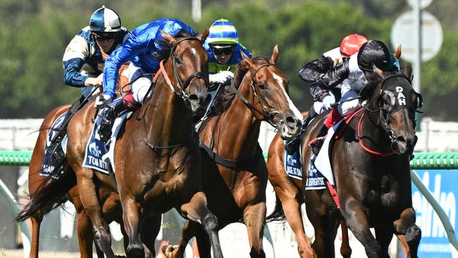 Another Wil (blue and green cap) caught in the backwash. Picture: Vince Caligiuri/Getty Images