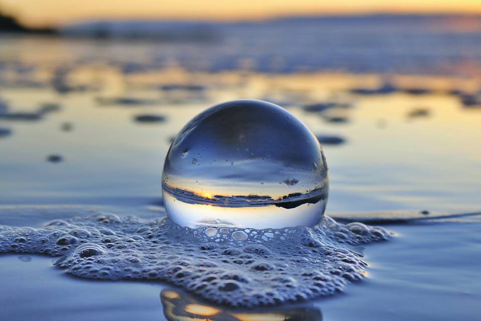 Shelly Beach reflection in a bubble for Photo of the Day | Daily Telegraph