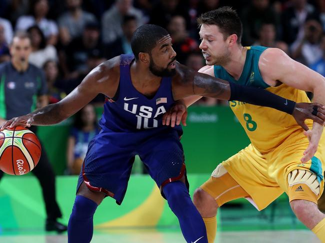 Kyrie Irving and Matthew Dellavedova in action during the Rio Olympics 2016 Men's Basketball game between the Australian Boomers and the USA Dream Team at Carioca Arena. Pics adam Head