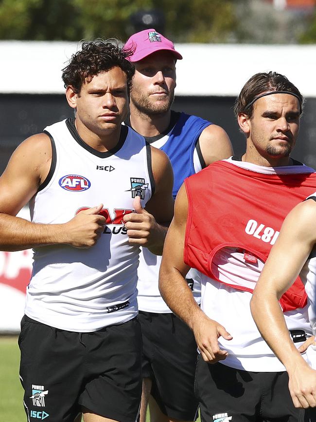 Steven Motlop with his new teammates at Alberton Oval. Picture: Sarah Reed