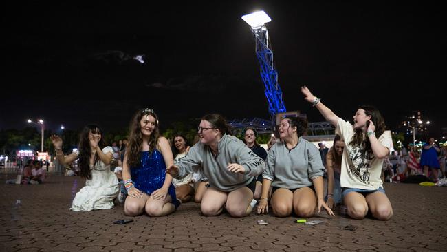 Taylor Swift fans listening to the concert outside the Accor Stadium.