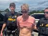 Moment ‘gunman’ arrested after lying in wait for Trump