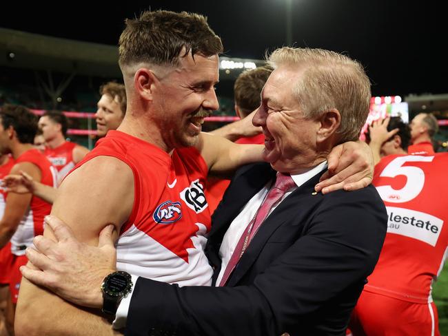 SYDNEY, AUSTRALIA - SEPTEMBER 07: Jake Lloyd of the Swans celebrates with Sydney Swans chairman Andrew Pridham after winning  the AFL First Qualifying Final match between Sydney Swans and Greater Western Sydney Giants at Sydney Cricket Ground, on September 07, 2024, in Sydney, Australia. (Photo by Cameron Spencer/Getty Images)