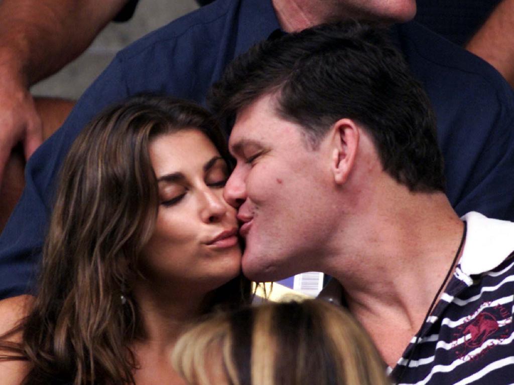 Media executive James Packer (r) with his wife mannequin fashion designer Jodie (l) at Australian Open tennis in Melbourne 27 Jan 2002.