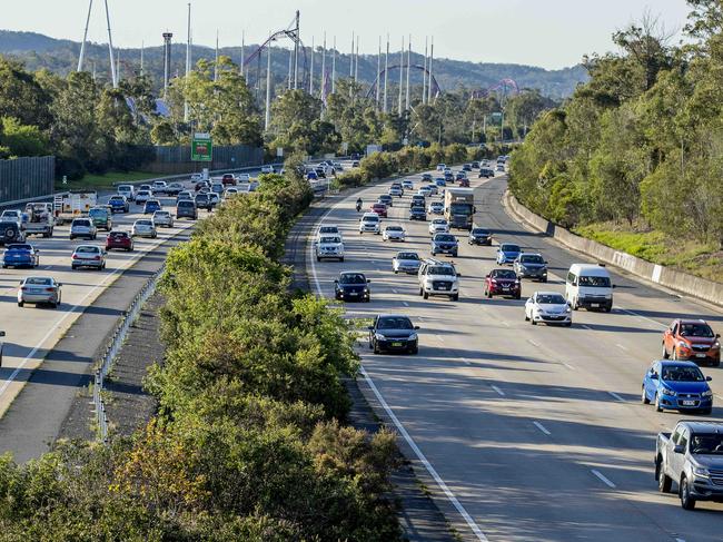 Traffic heading North and South along the M1 through Helensvale. Taken from pedestrian walkway at 4:30pm.   Picture: Jerad Williams