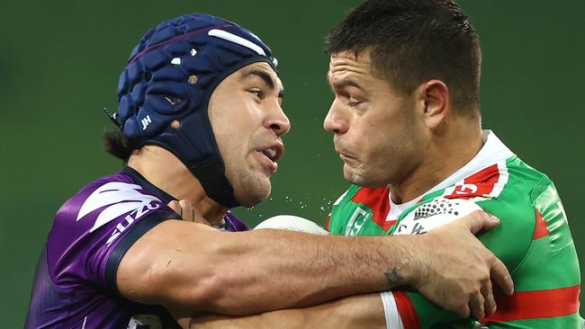 MELBOURNE, AUSTRALIA - JUNE 05: Dane Gagai of the Rabbitohs is tackled by Jahrome Hughes of the Storm during the round four NRL match between the Melbourne Storm and the South Sydney Rabbitohs at AAMI Park on June 05, 2020 in Melbourne, Australia. (Photo by Robert Cianflone/Getty Images)