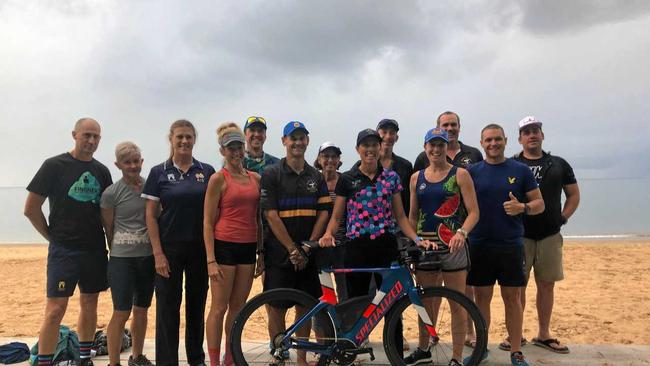 TRIATHLETES UNITED: Tony Young, Gayle Young, Carol McNaughton, Trudy Pavey, Tony Webster, Ken Wood, Catherine Wood, Katrina Tate, Richard James, Kaliki James, Jeff Morris, Troy Geltch and Reed Mackay who competed in Cairns last Sunday. Picture: Contributed