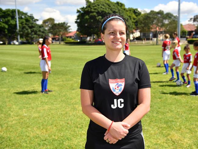 Pagewood Botany Football Club coach Julia Chernoukha poses for a photo at Jellicoe Park in Pagewood, Sydney, Saturday, Nov. 11, 2017. (AAP Image/Joel Carrett)