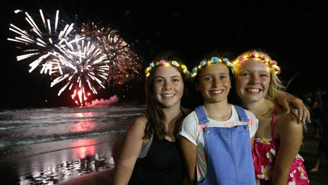 Pictured in Surfers Paradise for New Year’s Eve 2019 during the 8pm Fireworks: L-R Bethany Simpson, 13 Melbourne, Brianna Cauchley 11 of Labrador and Evie Nay 12 of Labrador. Picture: Michael Batterham