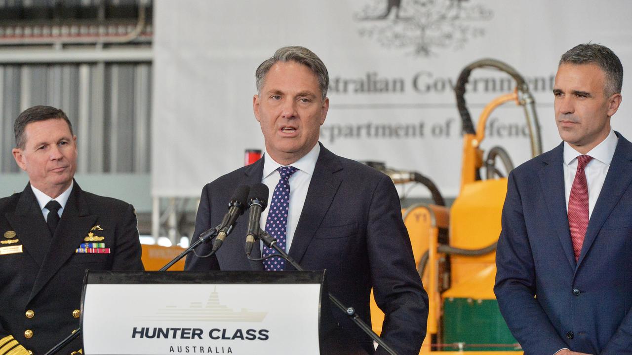 Deputy Prime Minister Richard Marles and Premier Peter Malinauskas at a ceremonial cutting of the first piece of steel to be used on the first Hunter class frigate to be constructed at the Osborne Naval Shipyard in Adelaide. Picture: NewsWire / Brenton Edwards