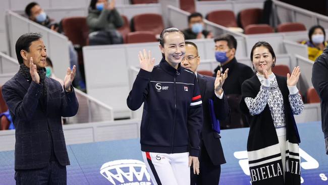 Peng Shuai endures a Communist Party regime-staged ‘proof-of-life’ parade at a junior tennis tournament in Beijing on Sunday. Picture: Eyepress via Reuters Connect